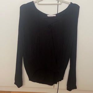 Black long sleeve shirt with lacing on the front (neck area)